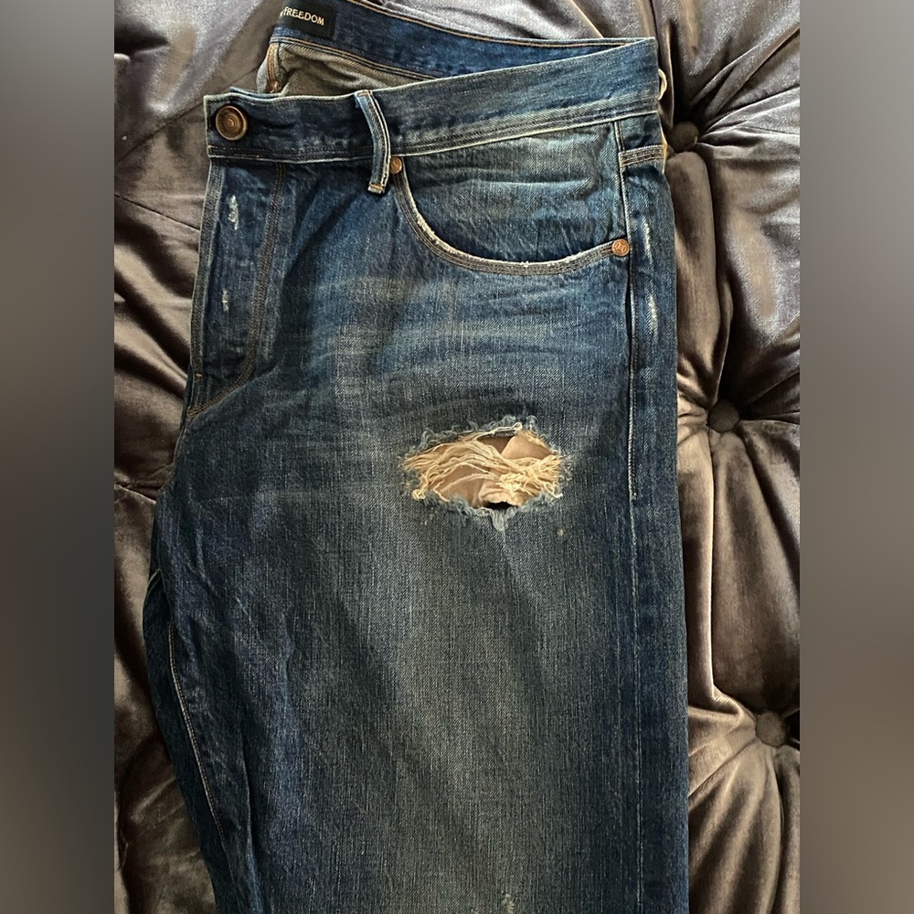 Torn style denim